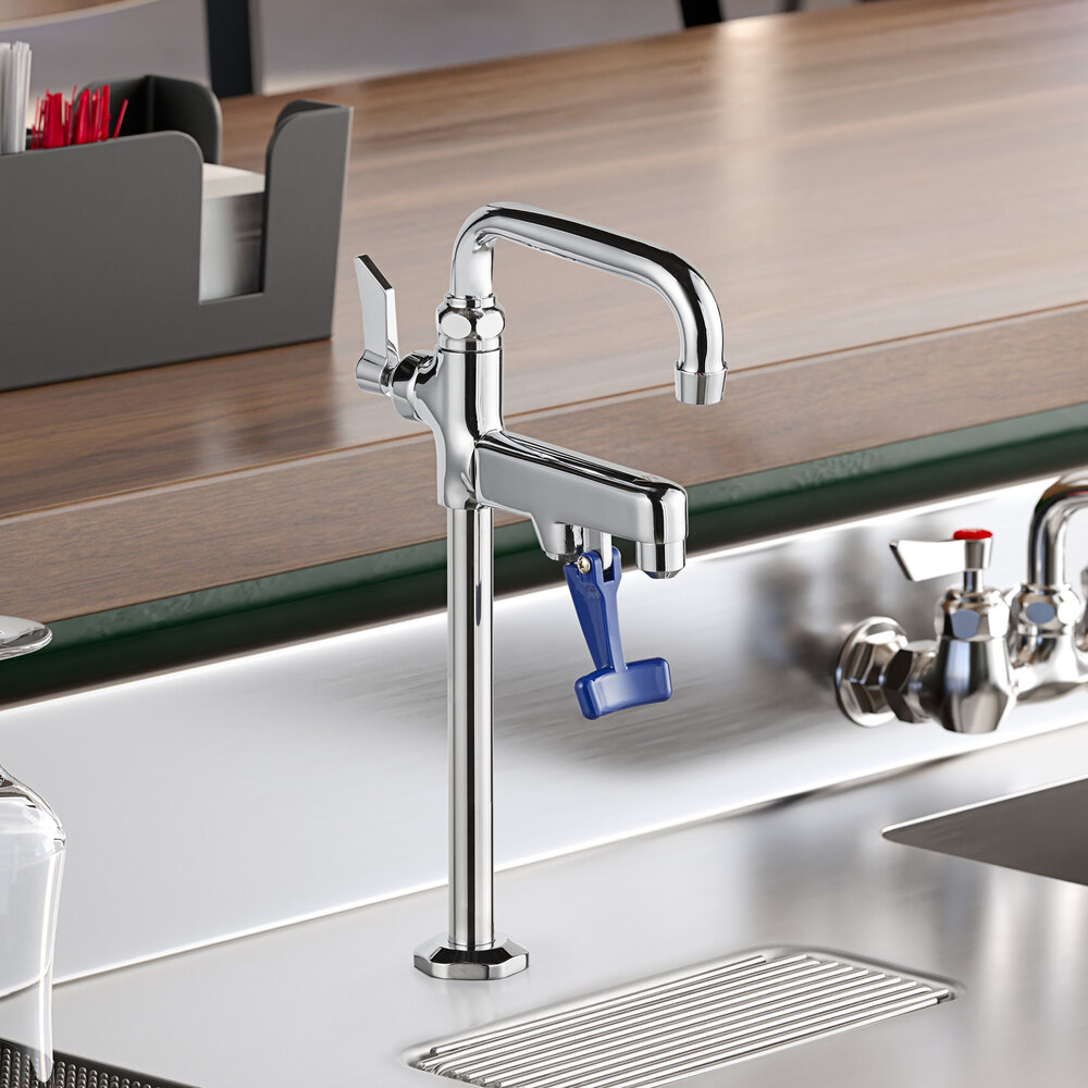 A Waterloo glass filler with swing nozzle on a kitchen counter.